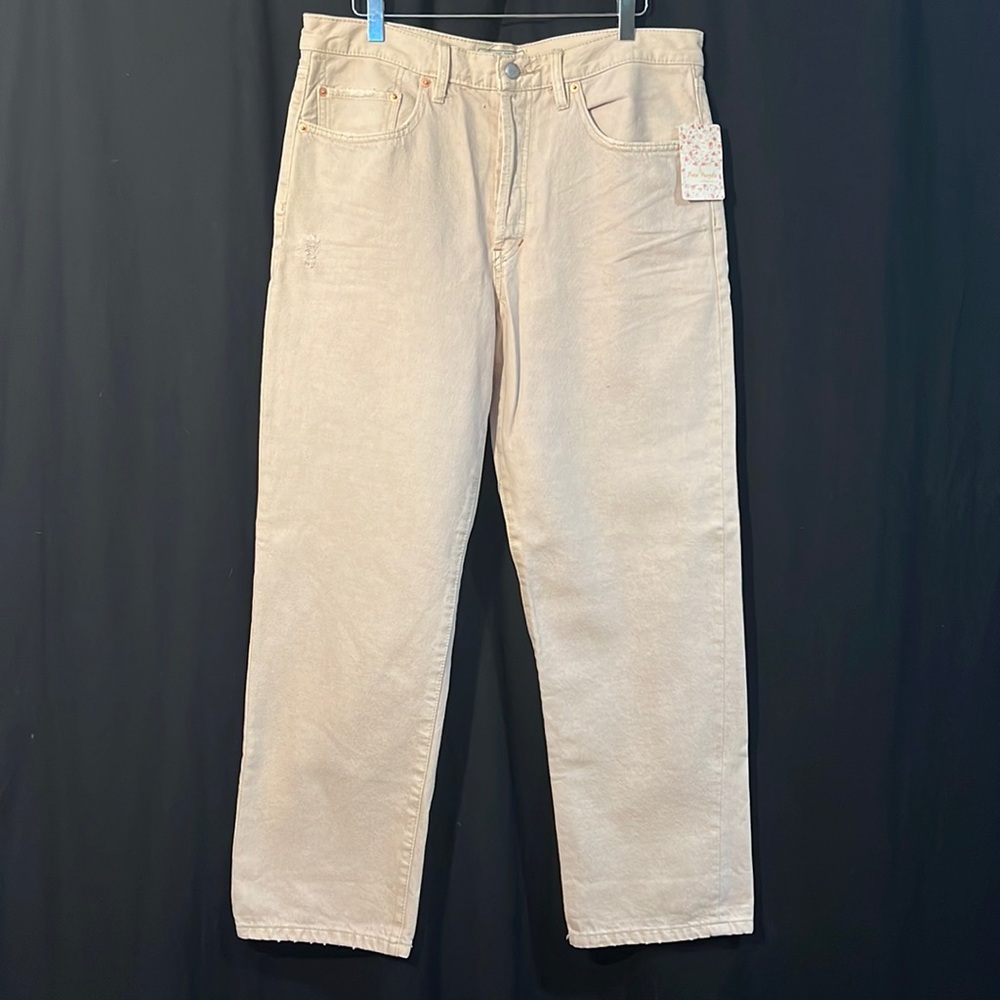 Free People “Worn White” distressed 5-pocket button-fly jeans